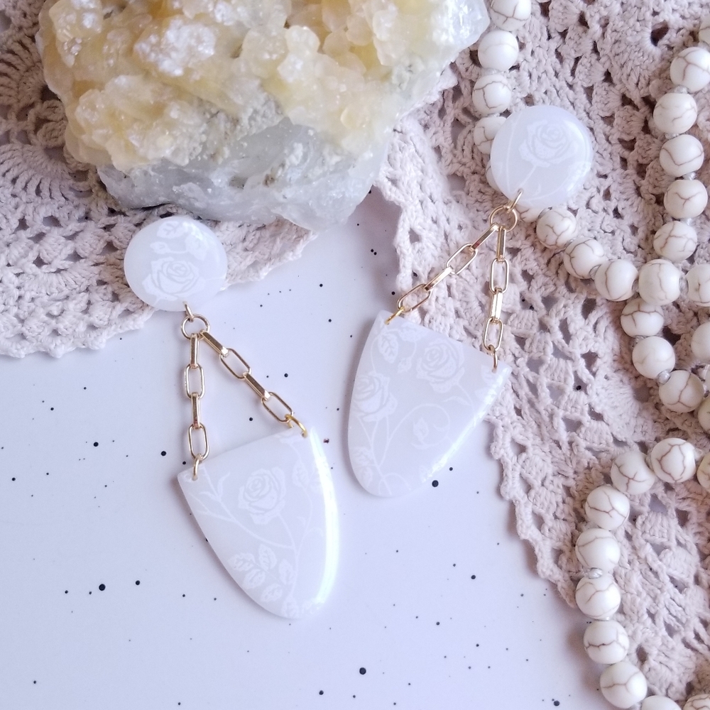 White floral earrings